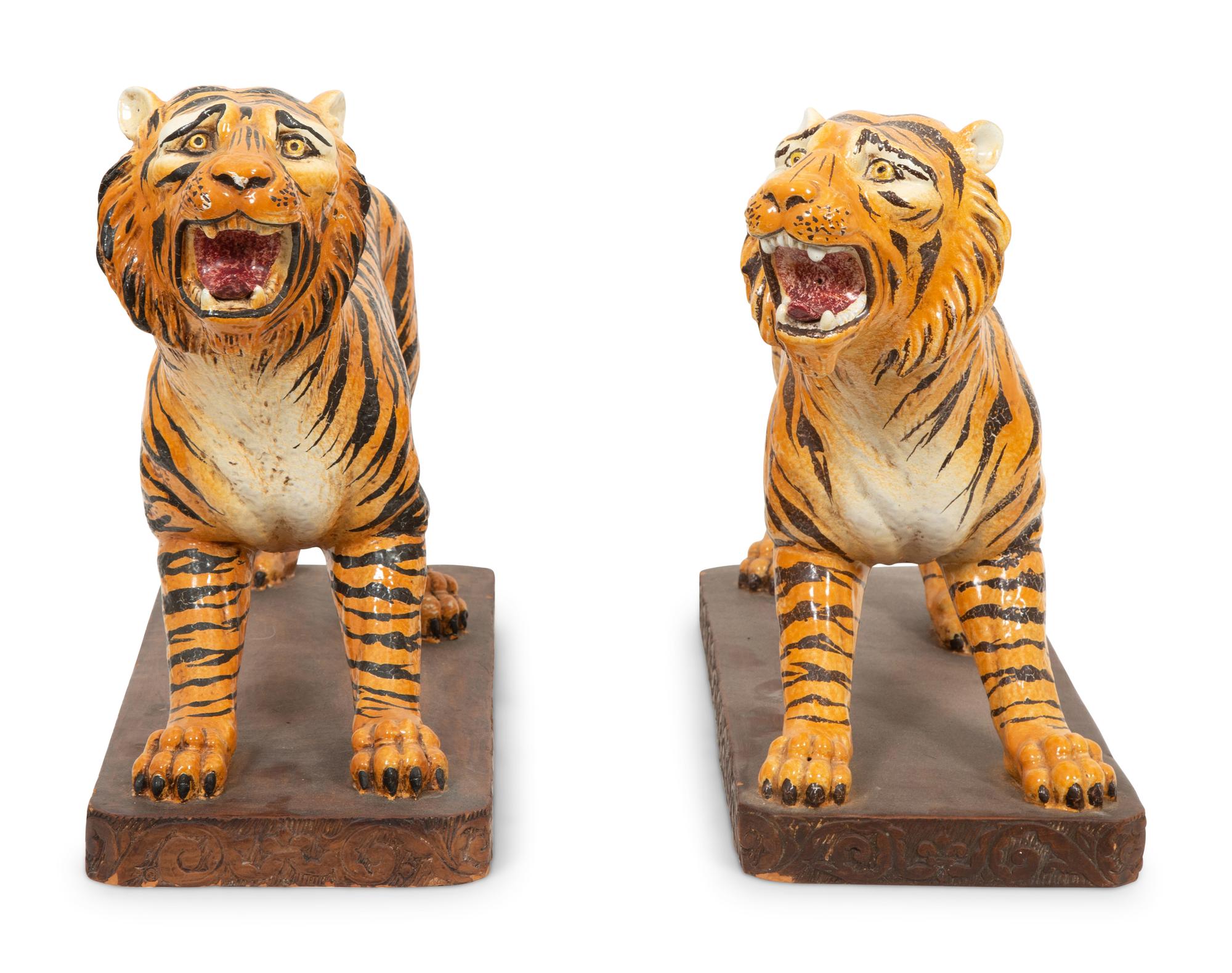 A Pair of Italian Glazed Terracotta Figures of Standing Tigers