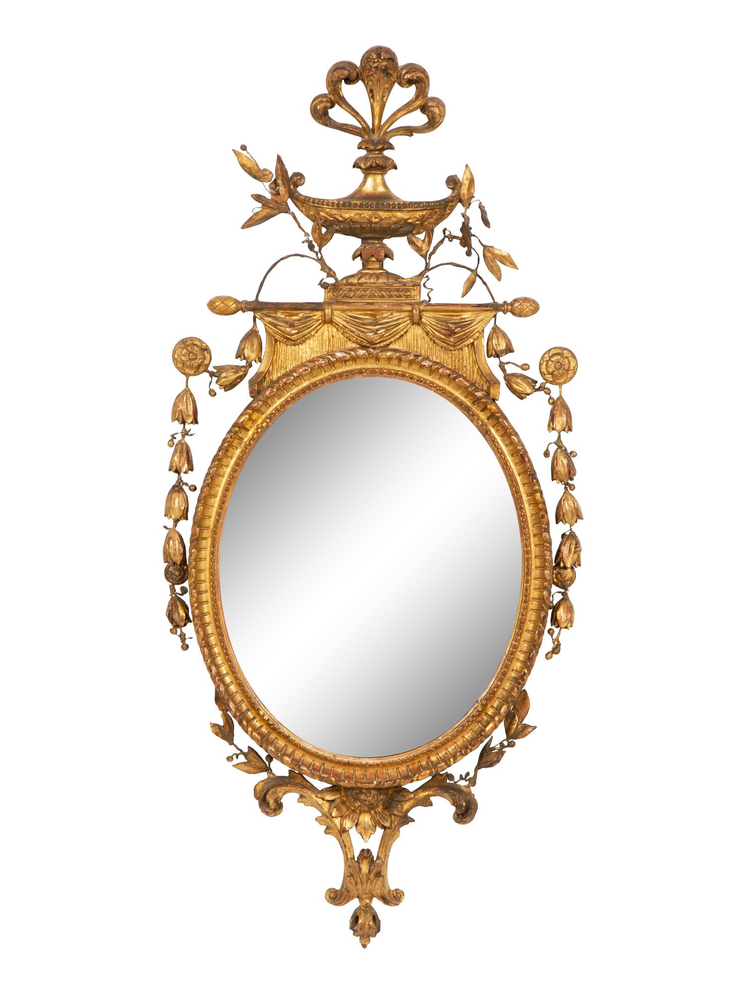 A Neoclassical Style Giltwood Oval Mirror