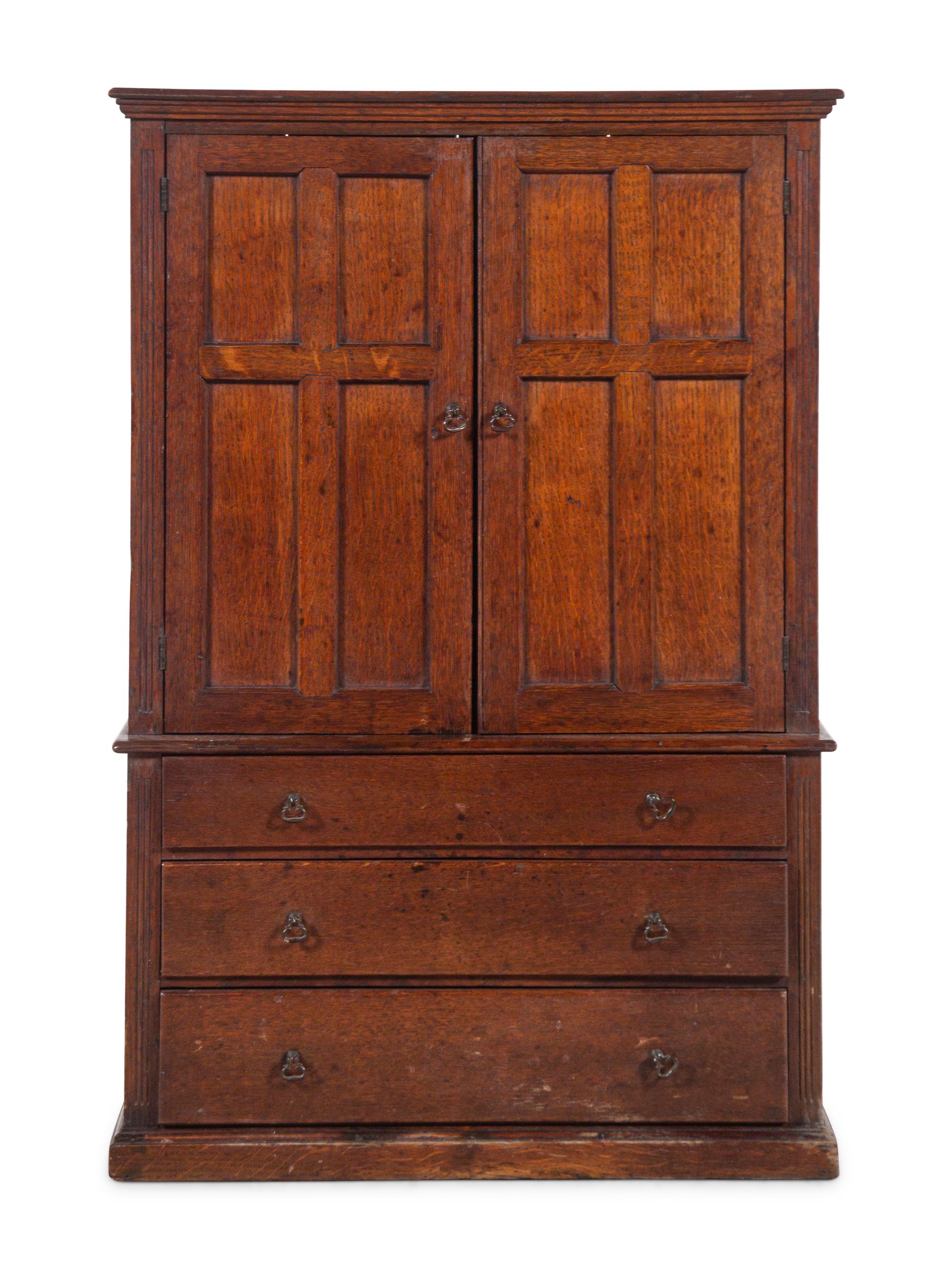 An English Oak Diminutive Cabinet