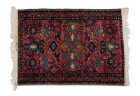 A Persian Wool Rug 2 feet 7 x 1 foot 10 inches.