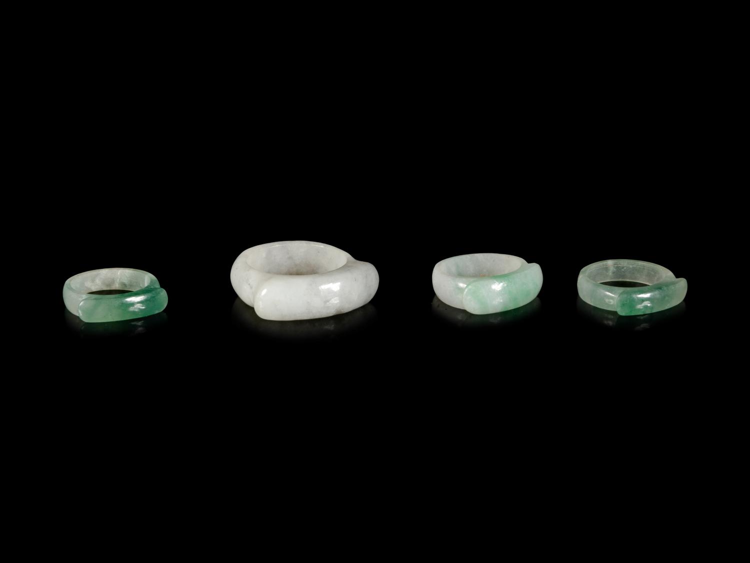 Four Chinese Jadeite Saddle Rings