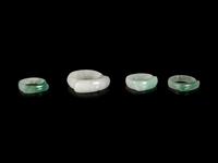 Four Chinese Jadeite Saddle Rings