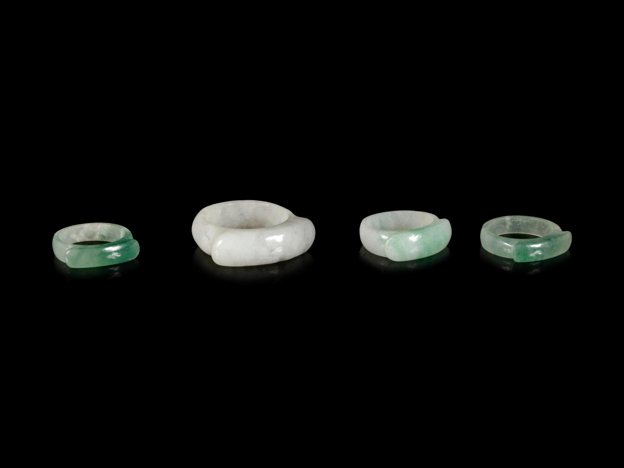 Four Chinese Jadeite Saddle Rings