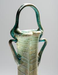 A Roman Green Glass Double Unguentarium
