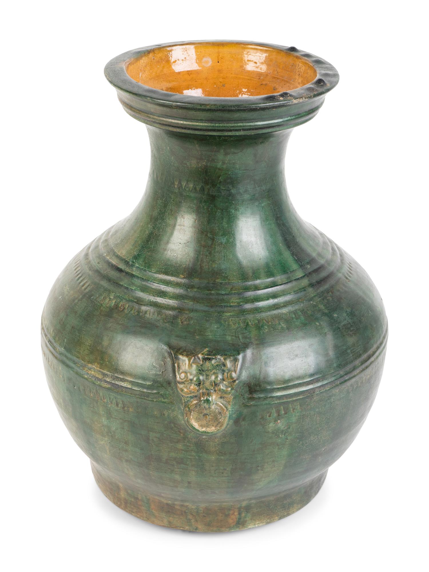 A Chinese Green-Glazed Terracotta Hu-Form Vase — HAN DYNASTY