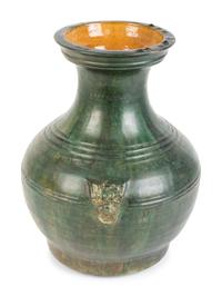 A Chinese Green-Glazed Terracotta Hu-Form Vase — HAN DYNASTY