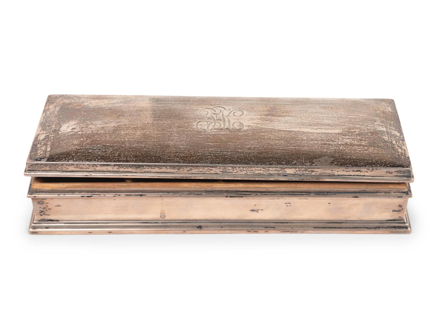 An American Silver Cigarette Box and a Teakwood Presentation Box from the H.M.S. Illustrious