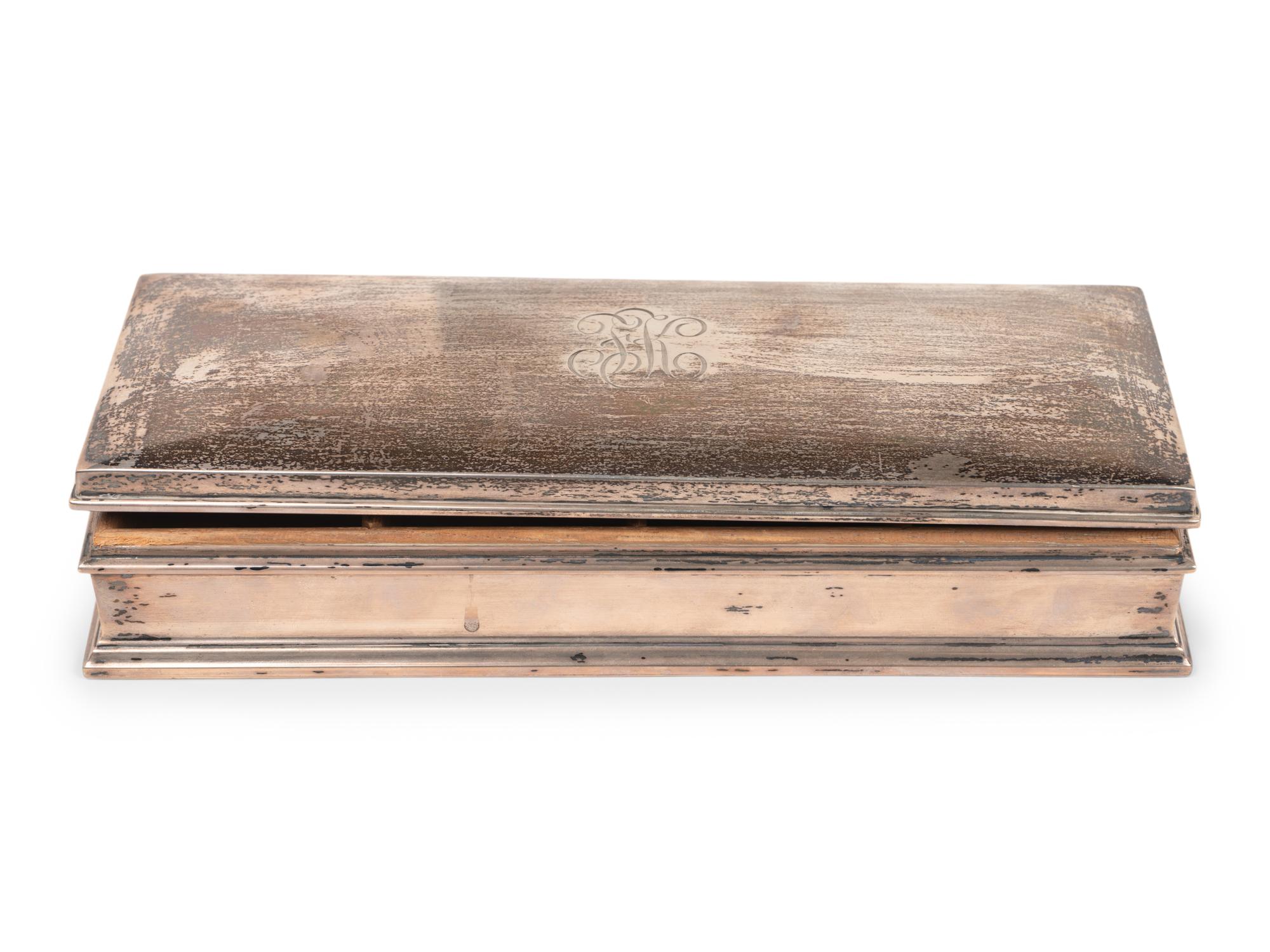 An American Silver Cigarette Box and a Teakwood Presentation Box from the H.M.S. Illustrious