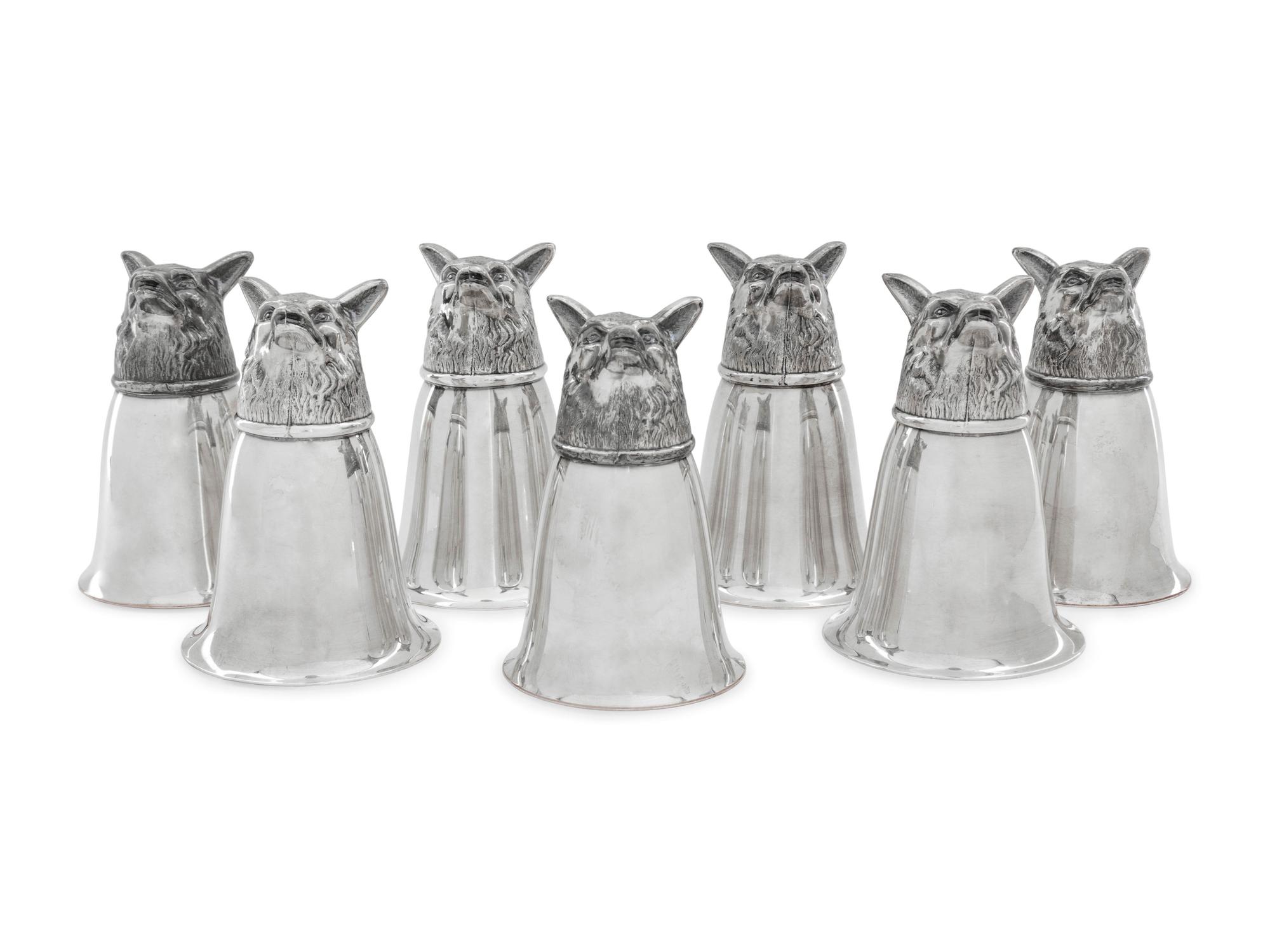 A Set of Seven Silver-Plate Stirrup Cups