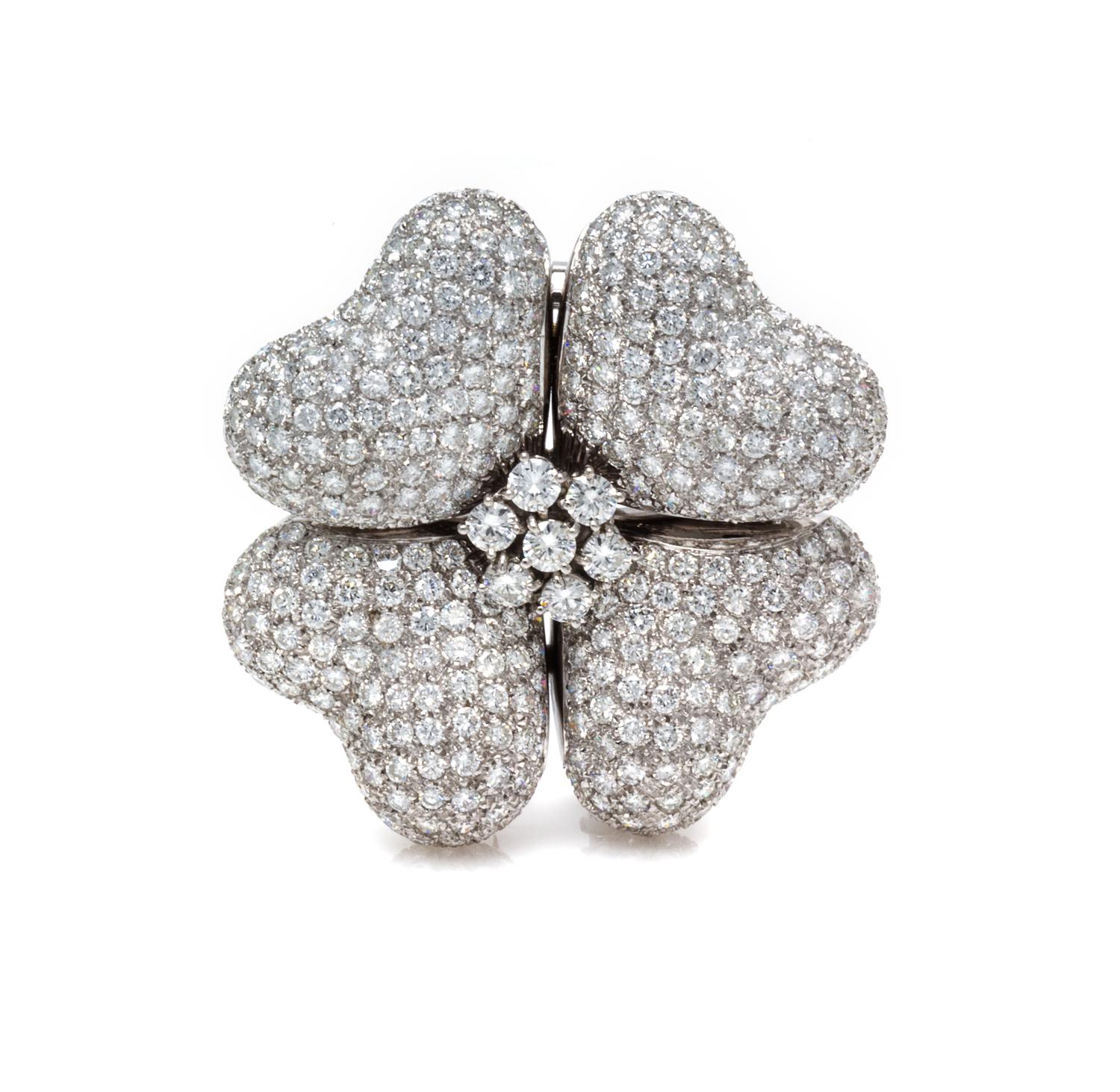 A White Gold and Diamond Flower Brooch, 20.50 dwts.