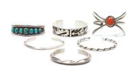 Six Silver Cuffs Largest 5 5/8 inches plus 3/4 inch opening.