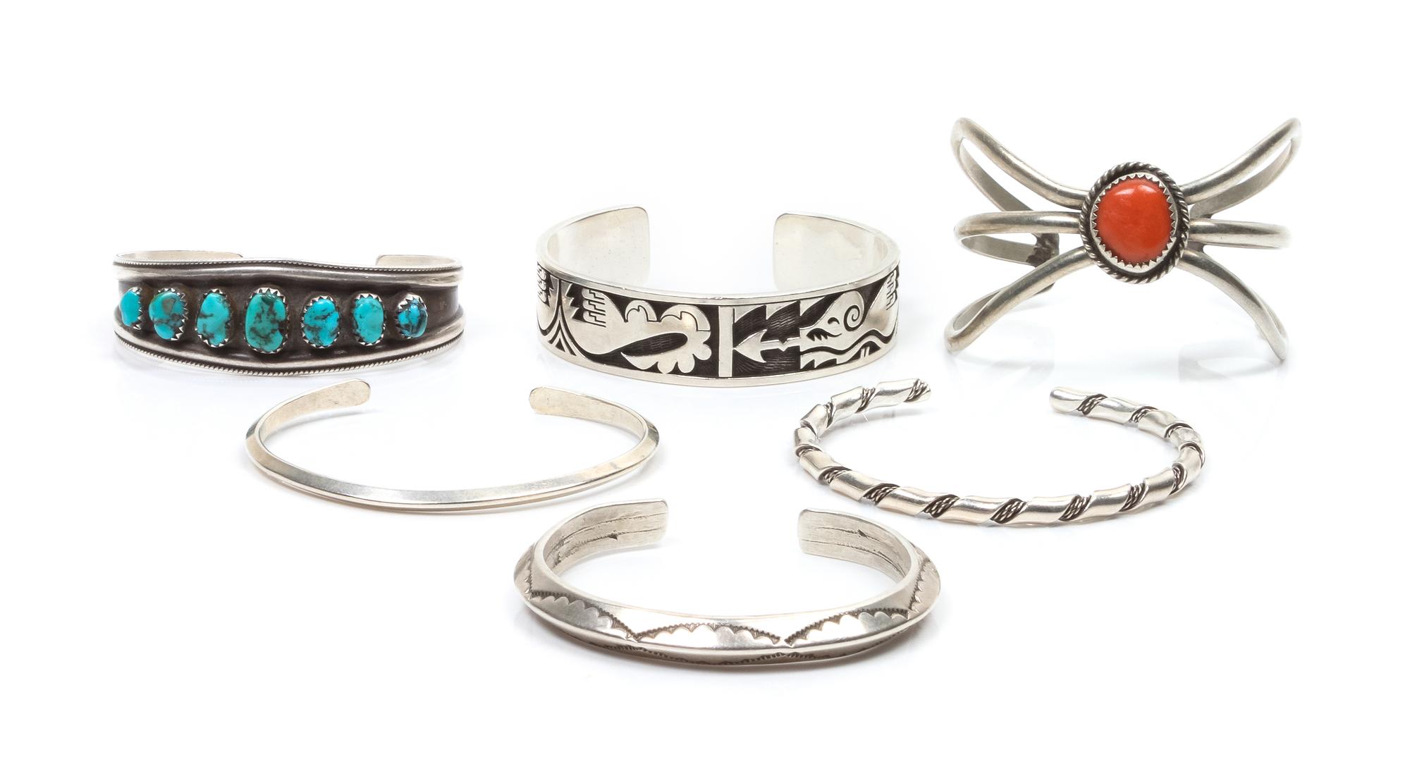 Six Silver Cuffs Largest 5 5/8 inches plus 3/4 inch opening.