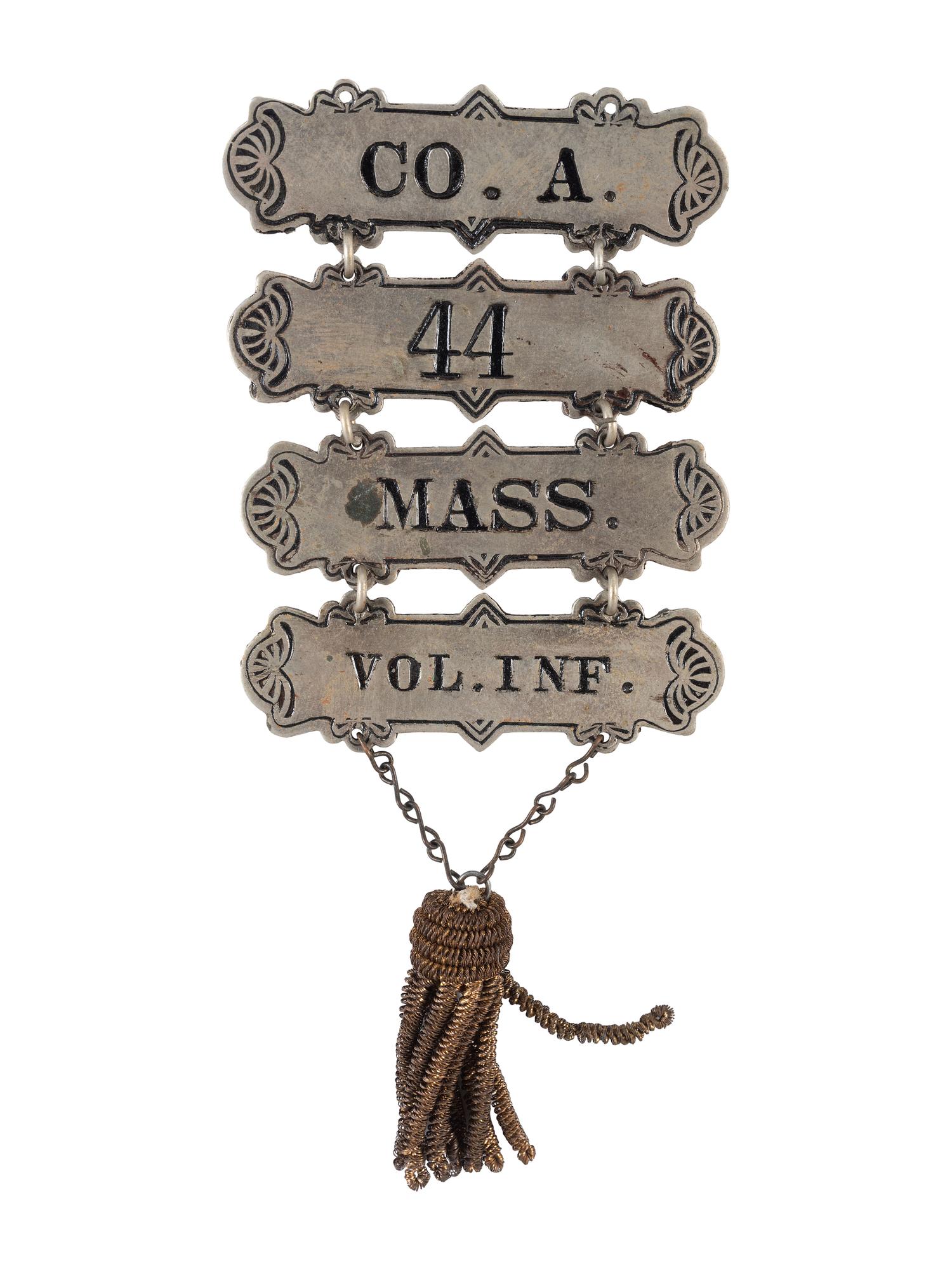 [CIVIL WAR]. Group incl. corps and ladder badges, 44th Massachusetts Infantry Regiment.