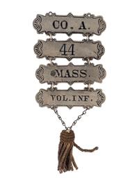 [CIVIL WAR]. Group incl. corps and ladder badges, 44th Massachusetts Infantry Regiment.