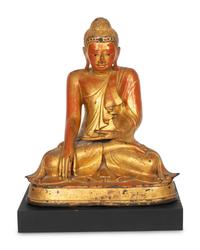A Burmese Gilt and Red Lacquered Bronze Seated Buddha