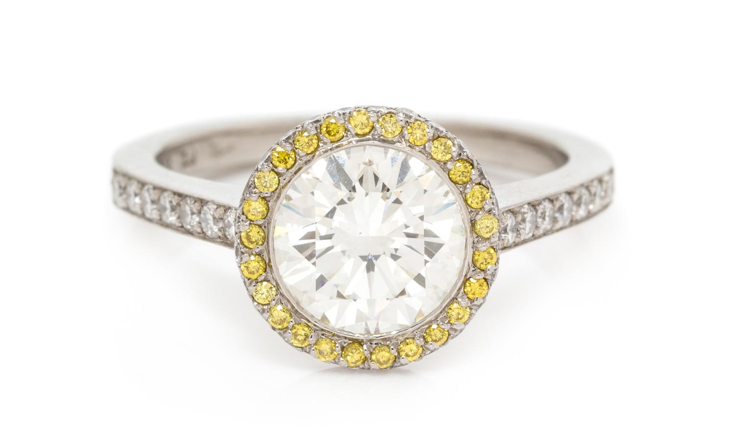 A Platinum, Diamond and Colored Diamond Ring, 3.70 dwts.