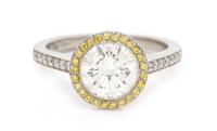A Platinum, Diamond and Colored Diamond Ring, 3.70 dwts.