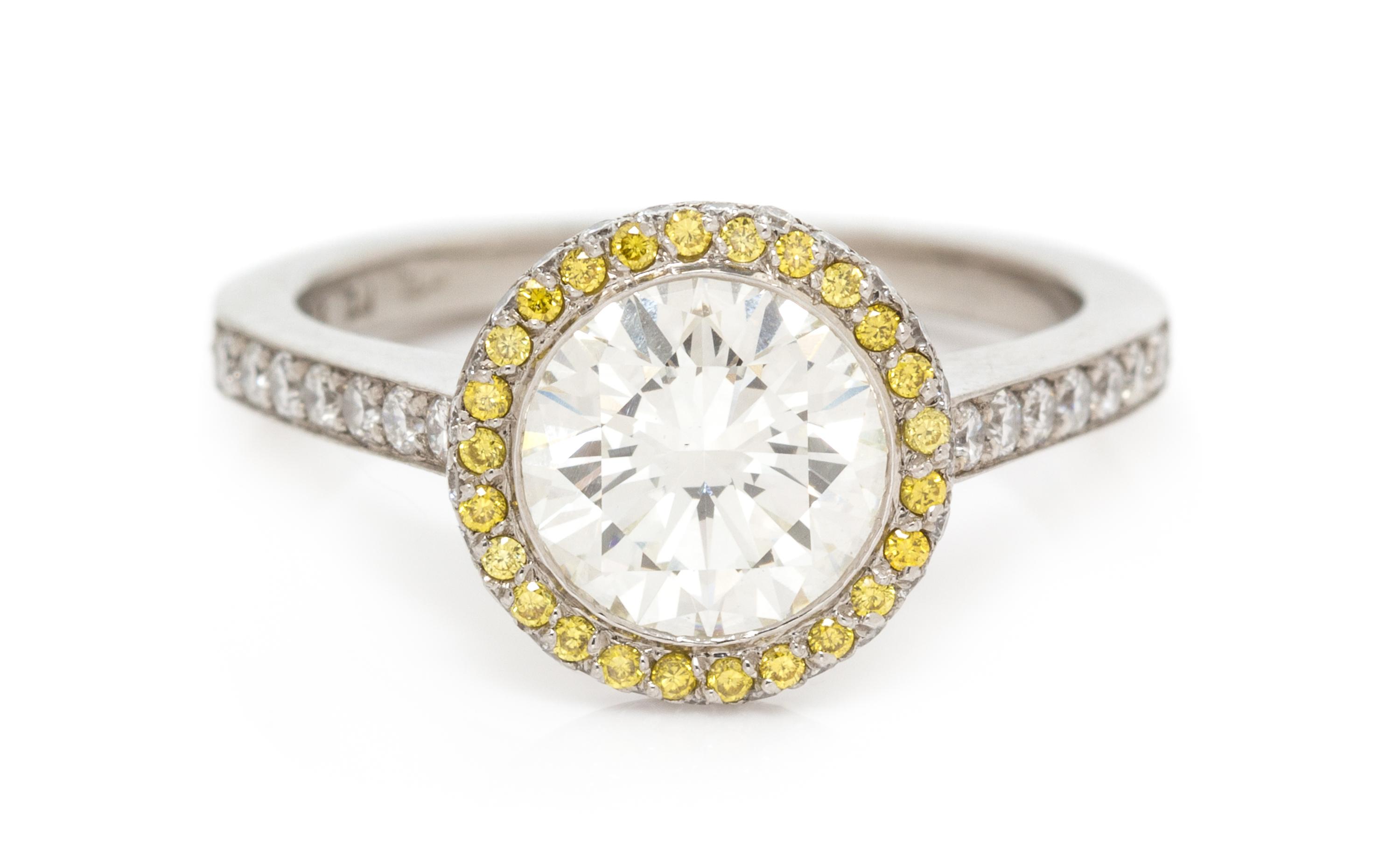 A Platinum, Diamond and Colored Diamond Ring, 3.70 dwts.