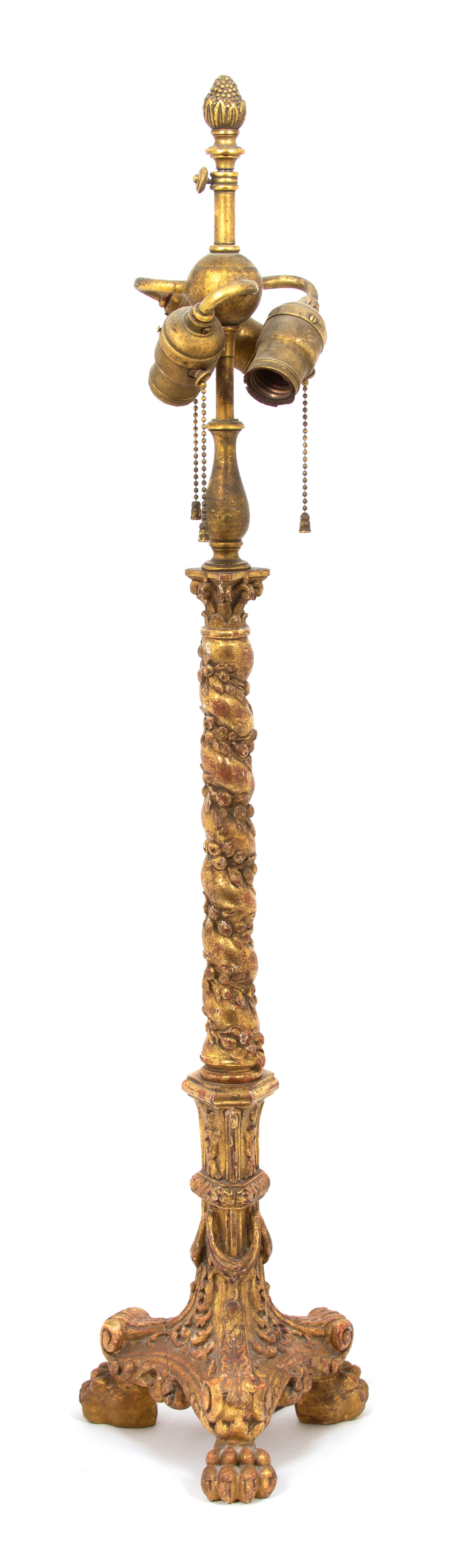 A George II Style Carved Giltwood Candlestick Height 31 1/2 inches. — 19TH CENTURY