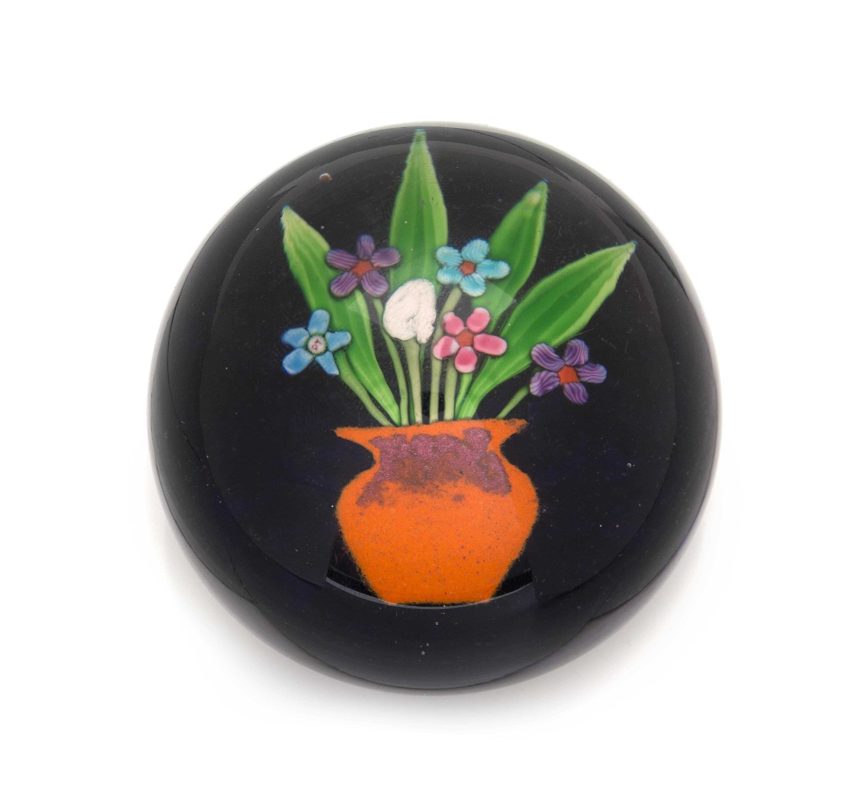 Paul Ysart, (Spanish, 1904-1991), a vase of flowers paperweight