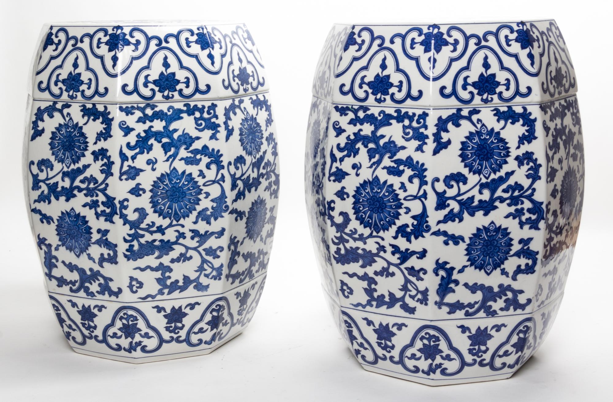 A Pair of Blue and White Porcelain Garden Seats. Height of each 19 inches.