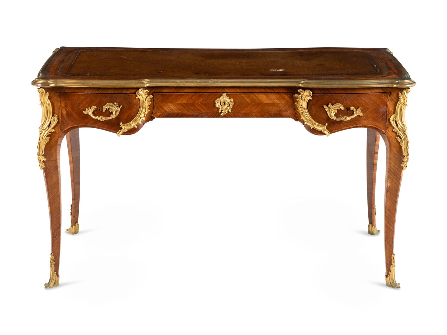 A Louis XV Style Gilt Bronze Mounted Parquetry Bureau Plat