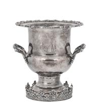 A Silvered Metal Candle Stand