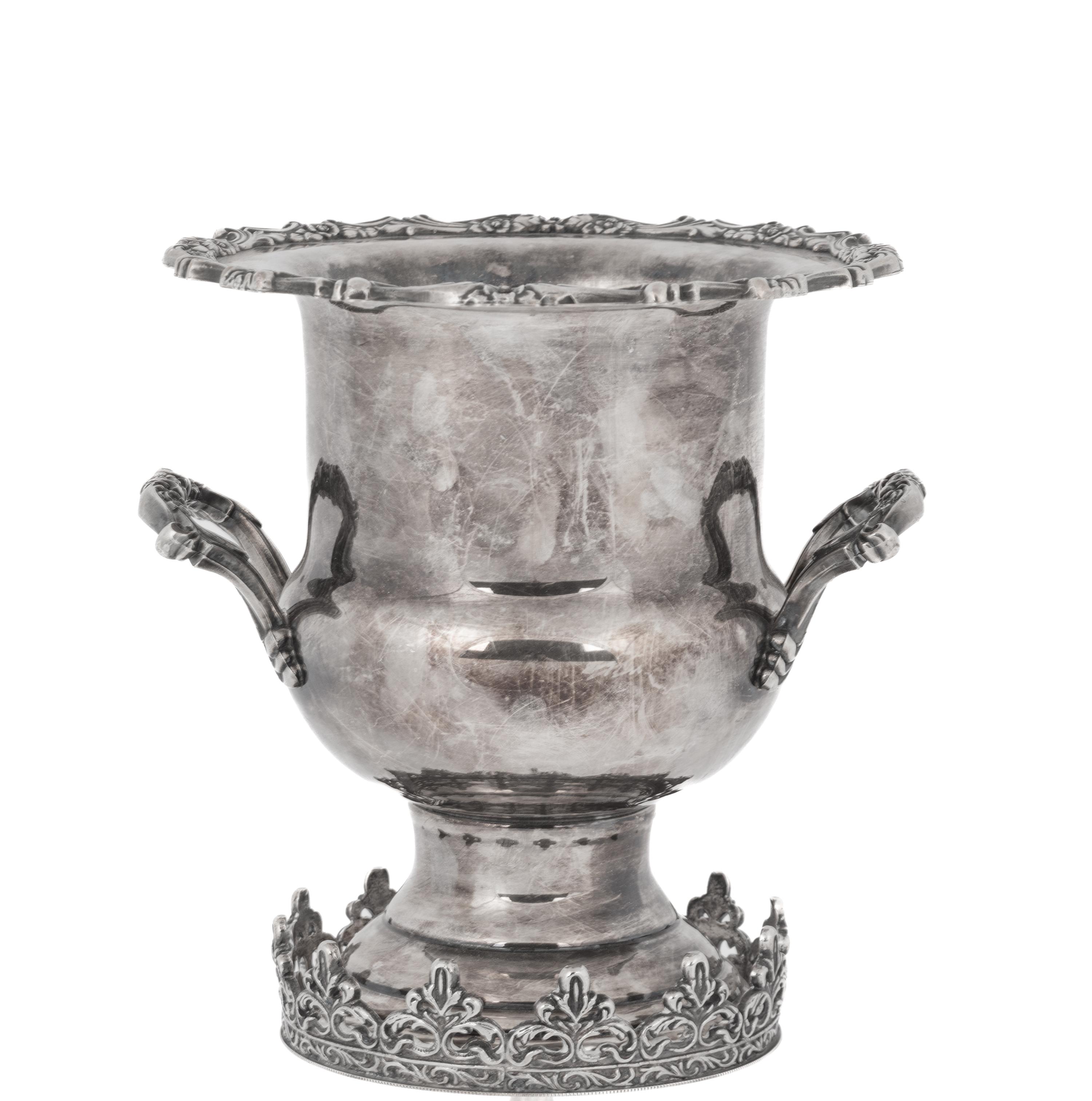 A Silvered Metal Candle Stand