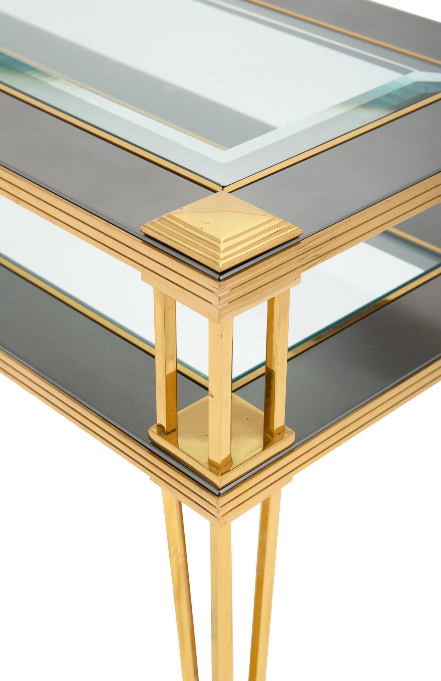 A Brass and Steel Tiered Side Table