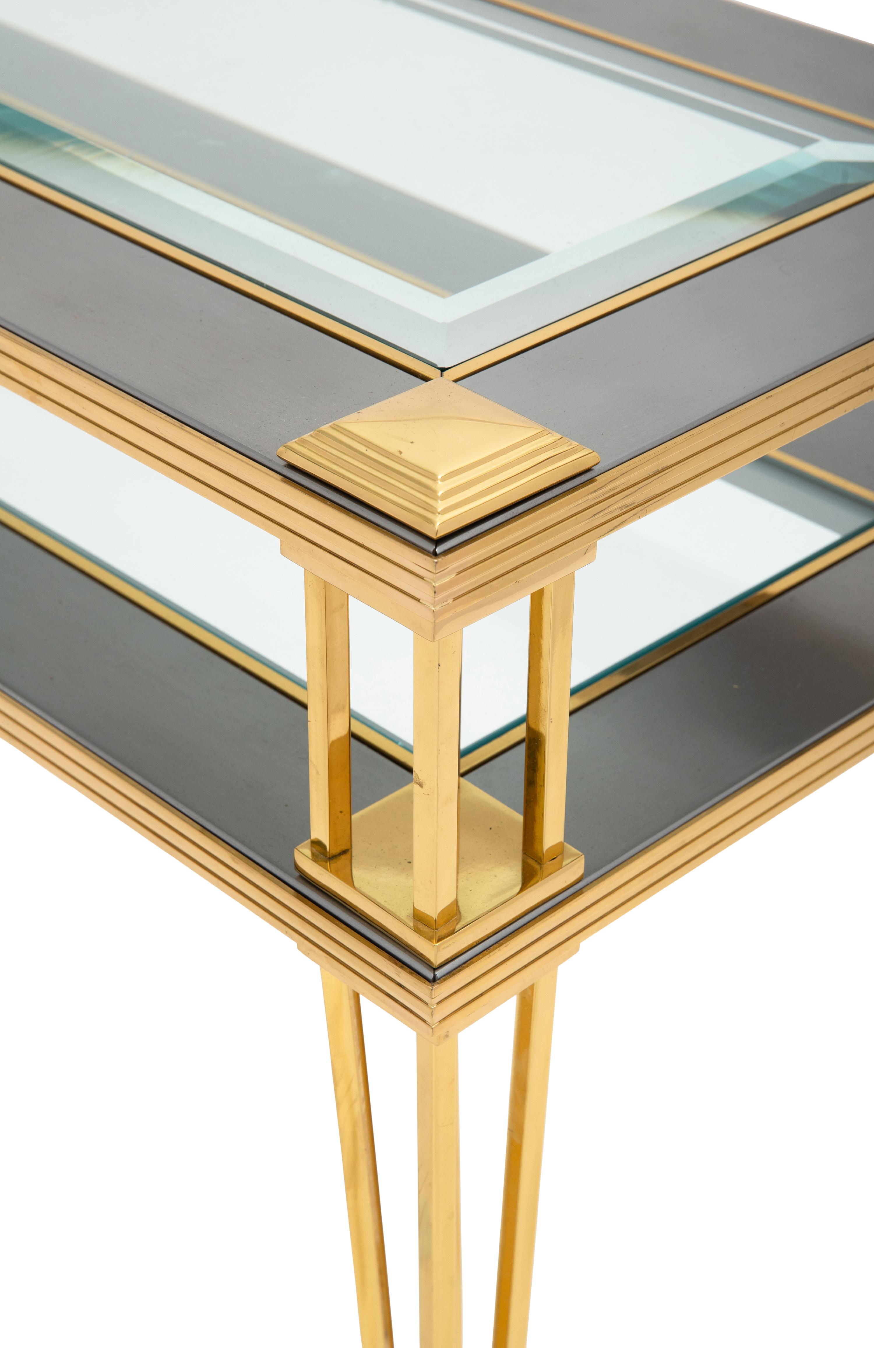 A Brass and Steel Tiered Side Table