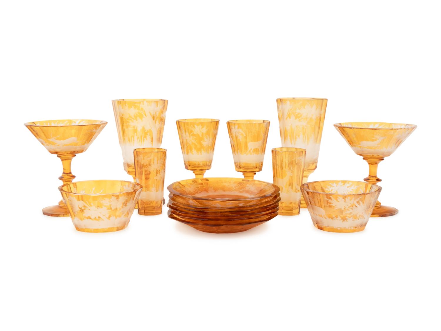 A Bohemian Cut-to-Clear Colored Glass Stemware Service