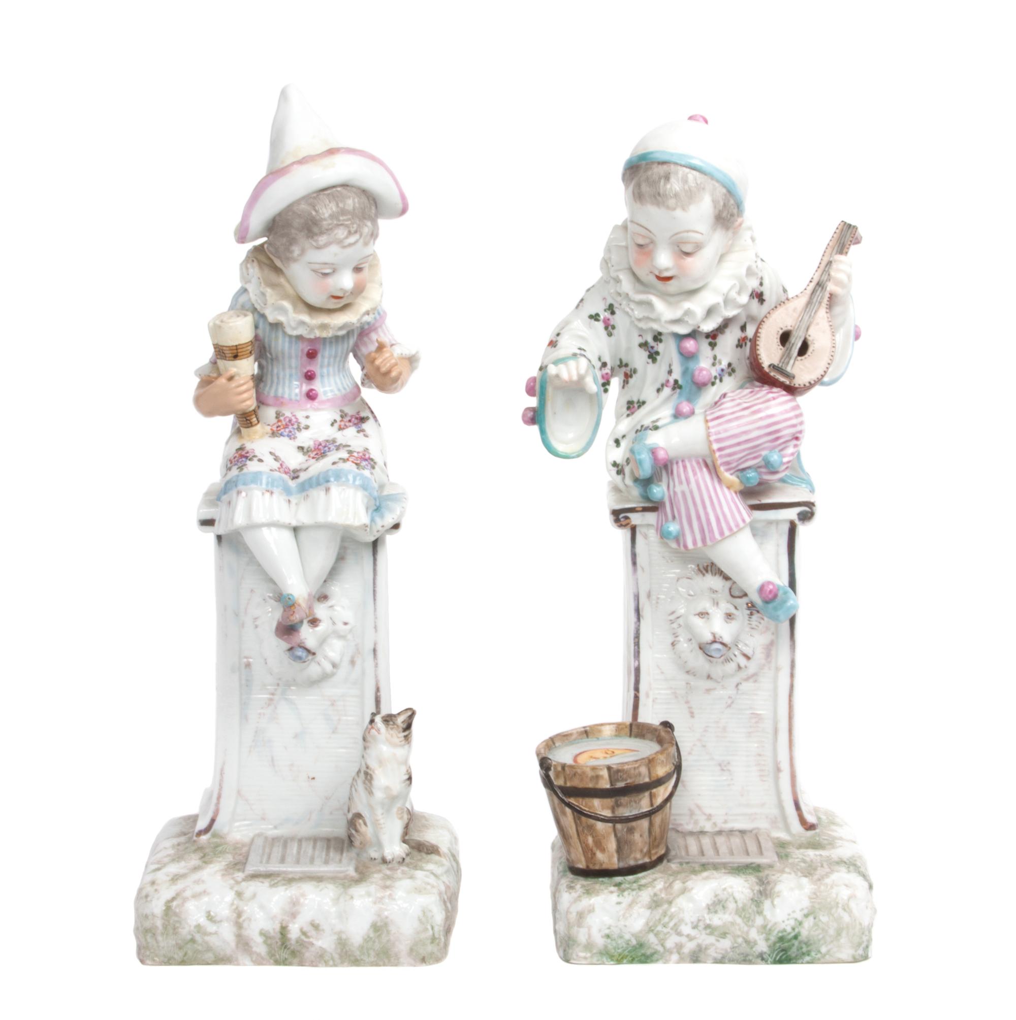 A Pair of Continental Porcelain Figures Height of taller 15 1/4 inches.