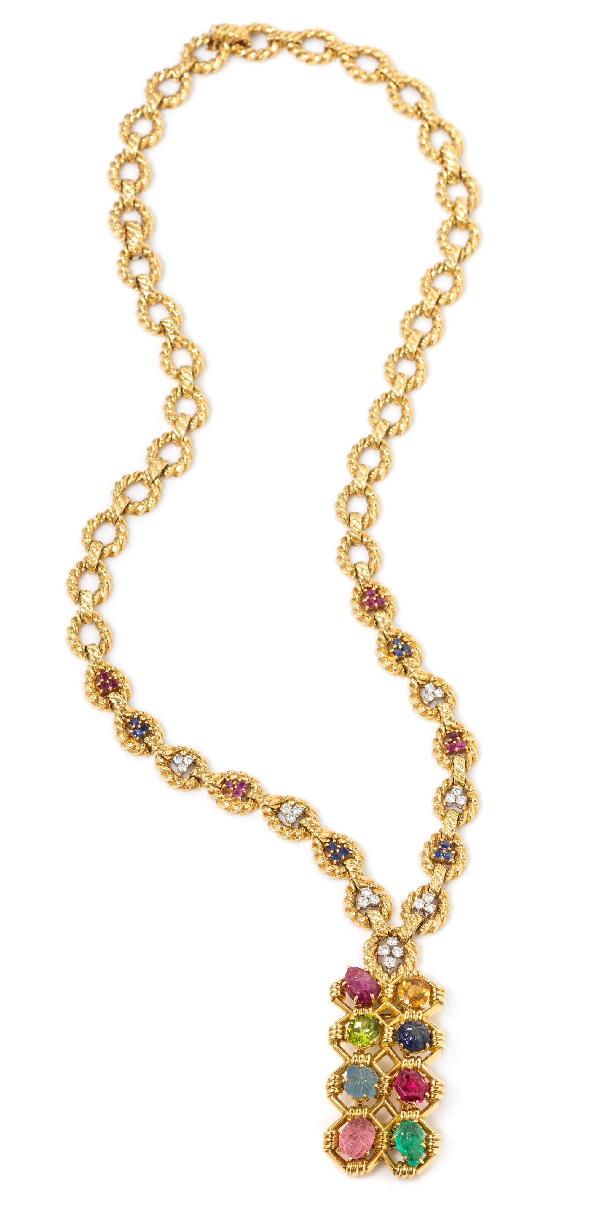 An 18 Karat Yellow Gold, Platinum and Multigem Pendant/Brooch with Convertible Necklace/Bracelet, David Webb, 109.45 dwts.