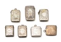 A Collection of Six Silver-Plate Smoking Articles, Various Makers, comprising four vesta cases and two cigarette cases.