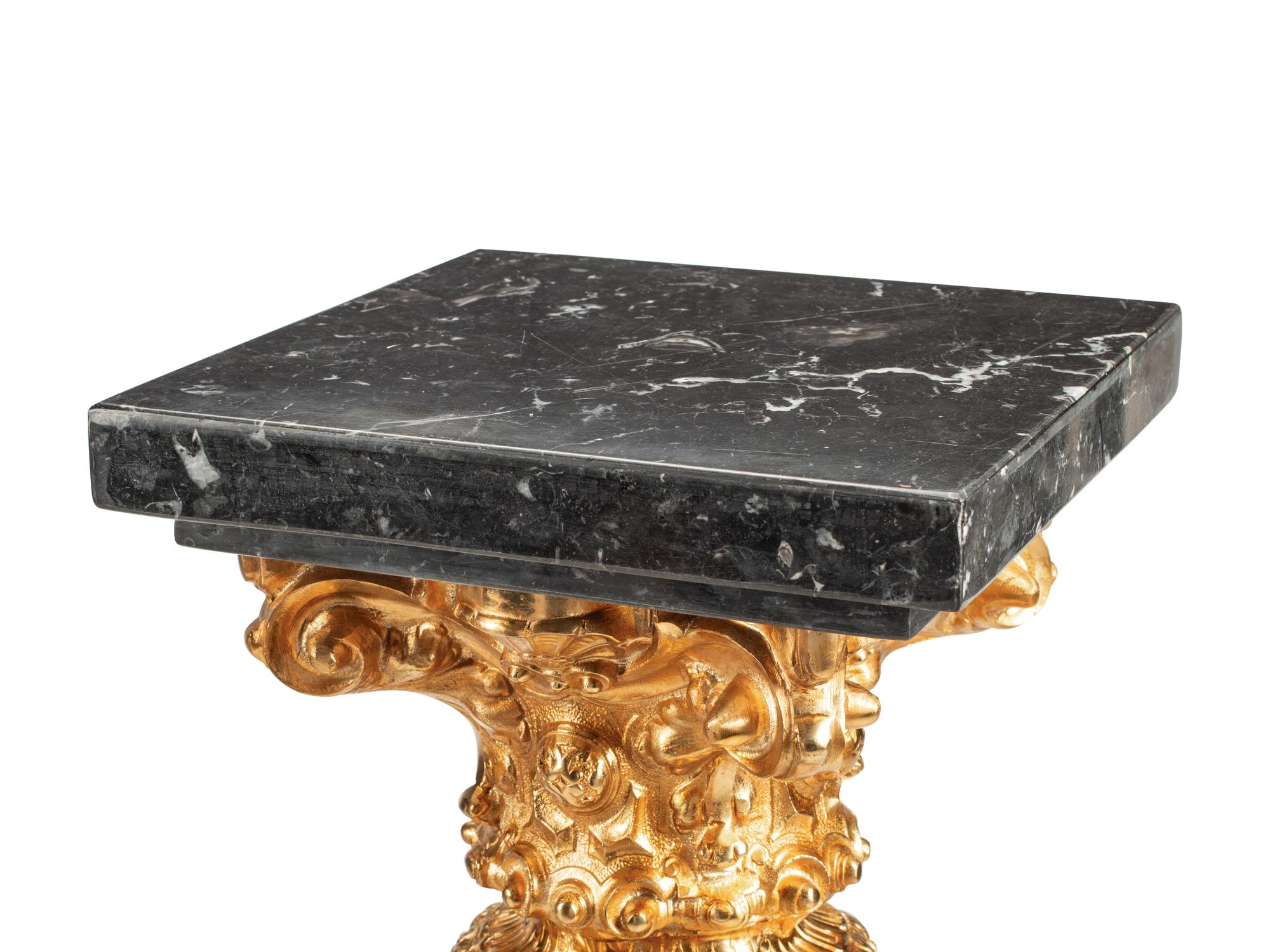 A Pair of Continental Gilt Bronze Mounted Marble Pedestals