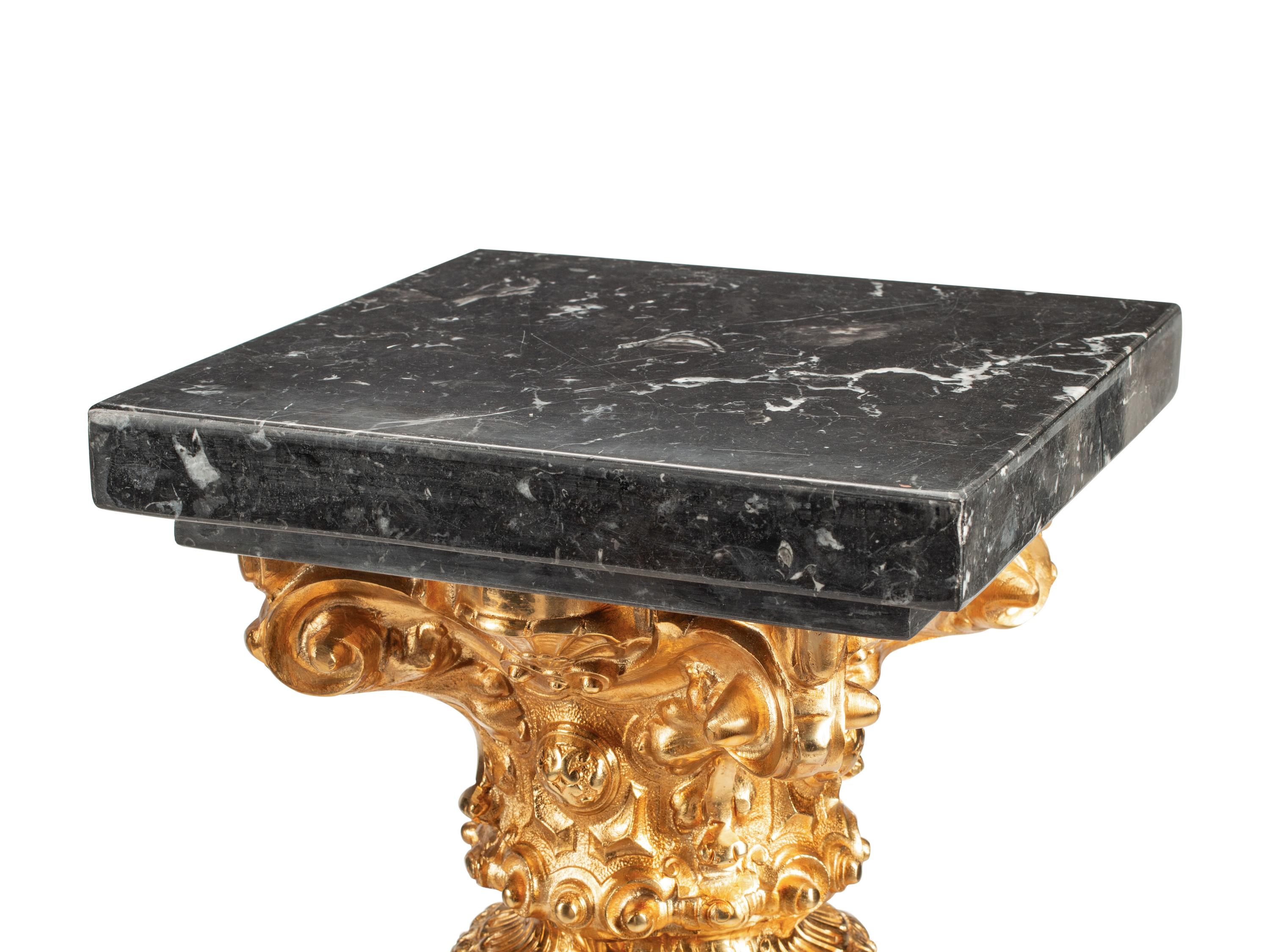 A Pair of Continental Gilt Bronze Mounted Marble Pedestals