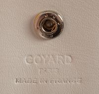 Six Goyard Items: Two Totes, Three Pouches, and One Wallet