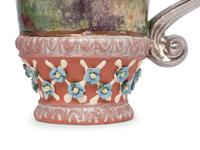 A Set of Fourteen MacKenzie-Childs Evervolving Ceramic Mugs