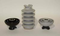 Three Haeger Pottery Insulators Height 11 1/2 inches.