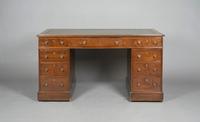 An English Mahogany Pedestal Desk, Height 28 x width 53 1/2 x depth 27 1/2 inches.