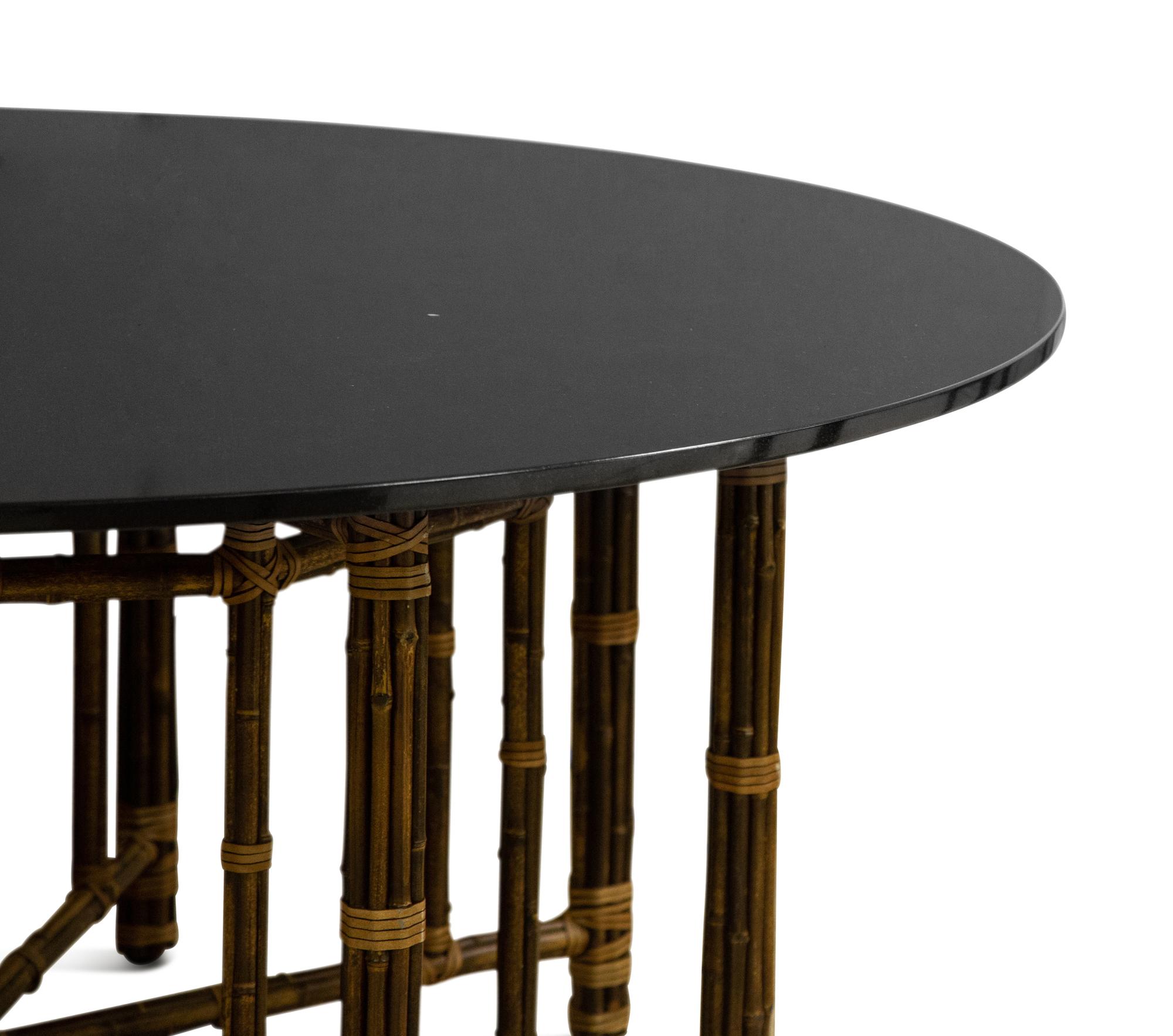 A McGuire Leather-Wrapped Bamboo Dining Table with Custom Black Granite Top