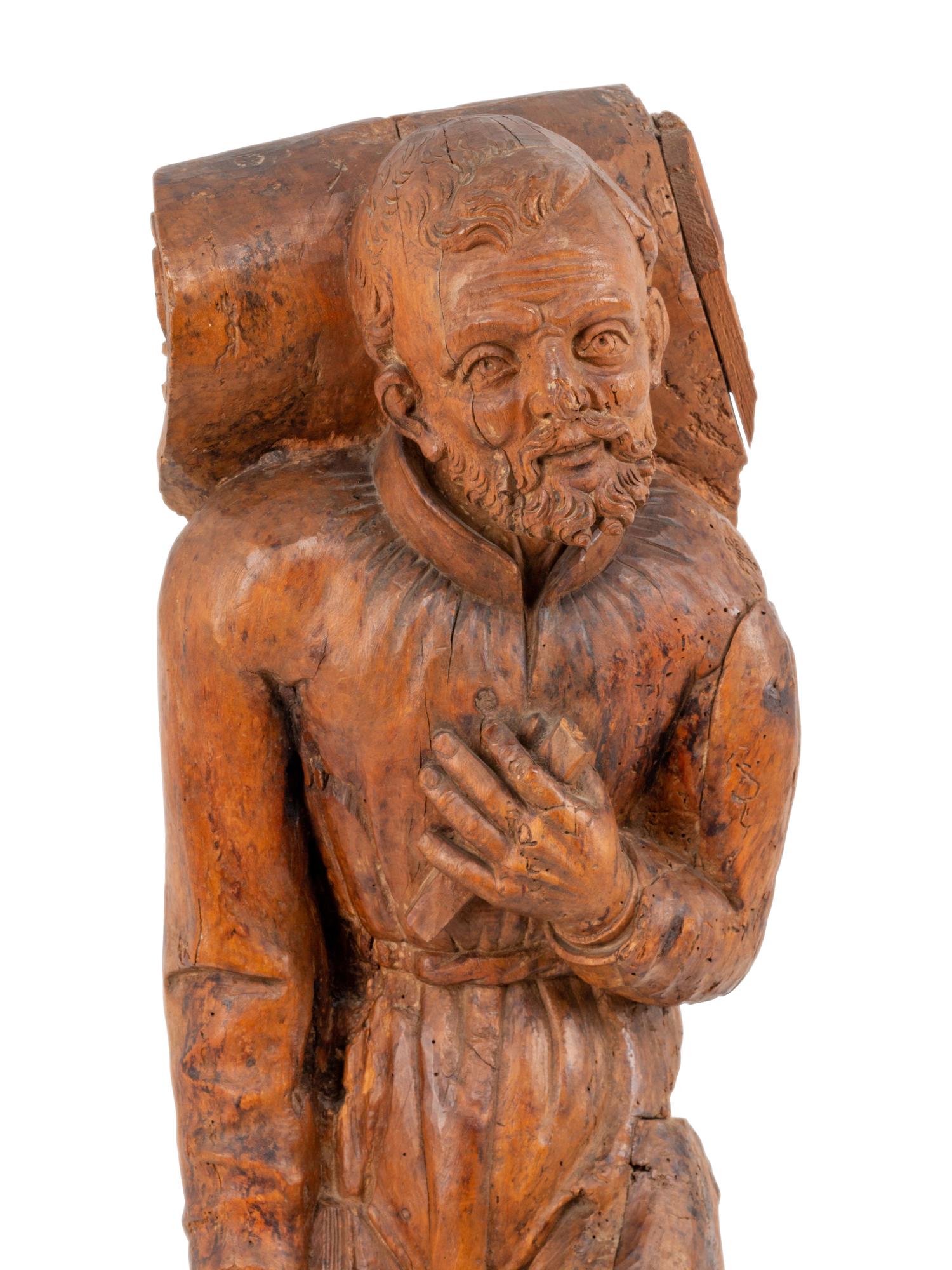 An Italian Carved Wood Figural Appliqué of a Saint