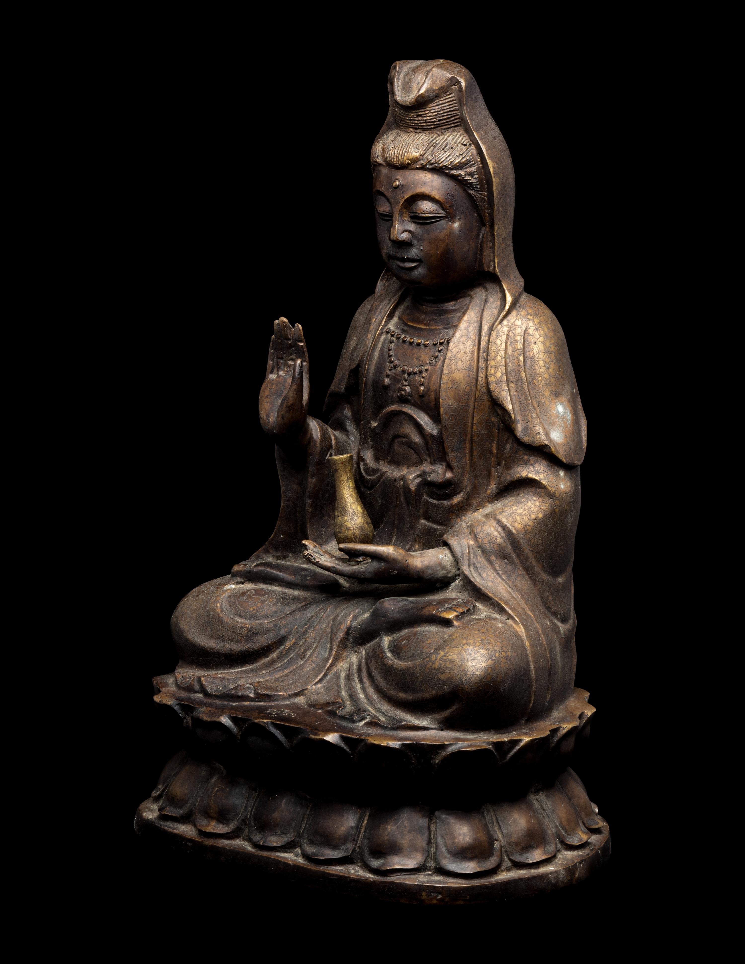 A Chinese Bronze Figure of Guanyin 銅觀音