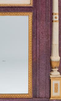 A Directoire Faux Porphyry Painted and Parcel Gilt Mirror