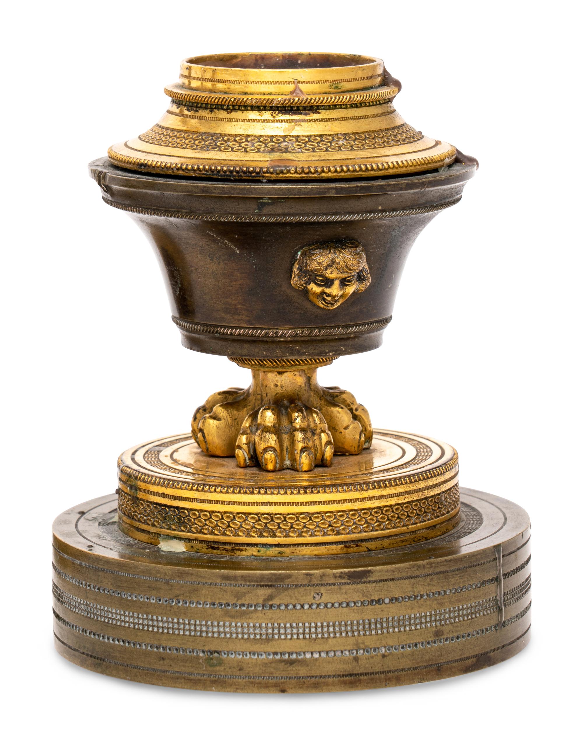 Two Pairs of Empire Gilt Bronze Candlesticks
