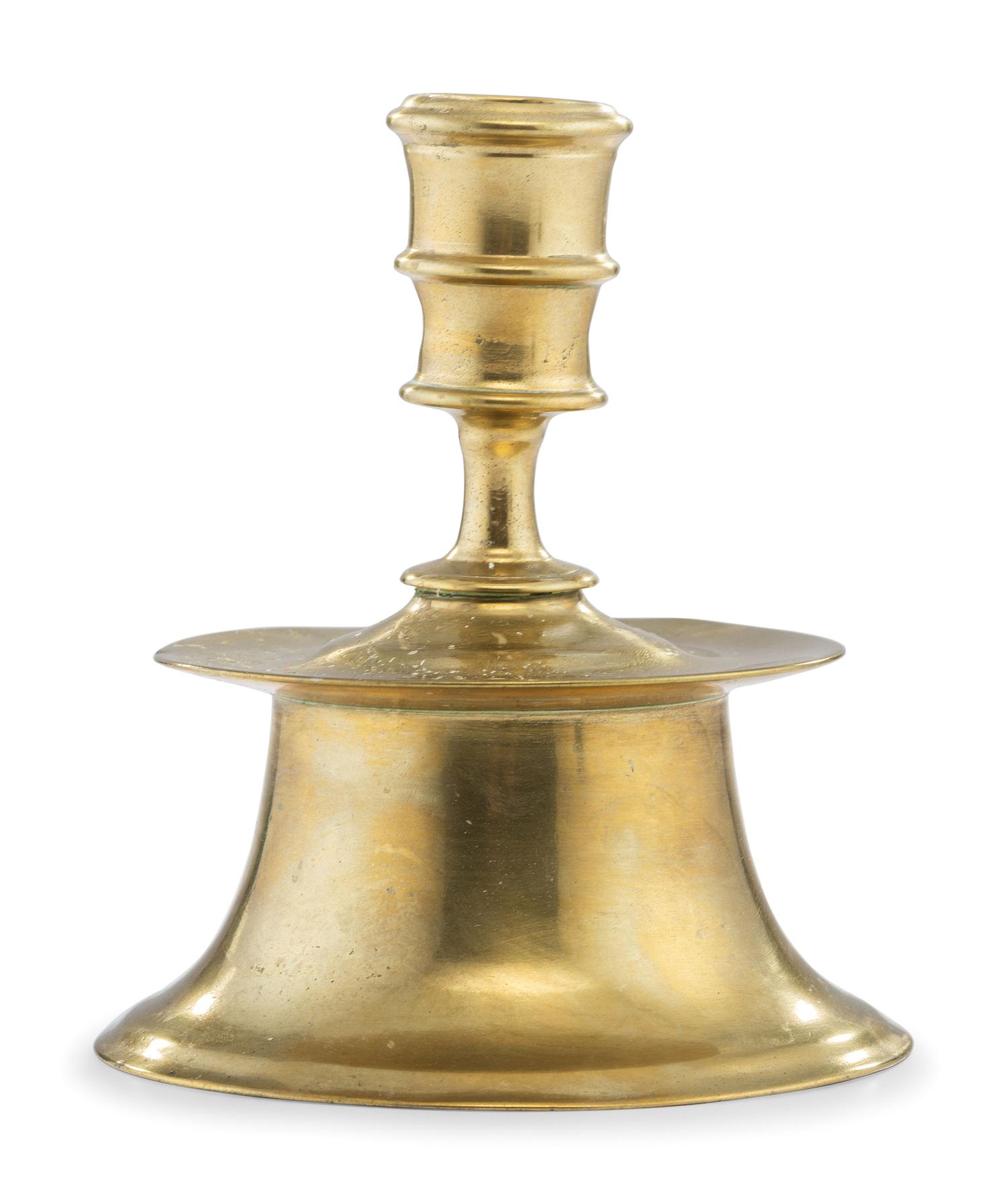 A Continental Brass Heemskerk Candlestick