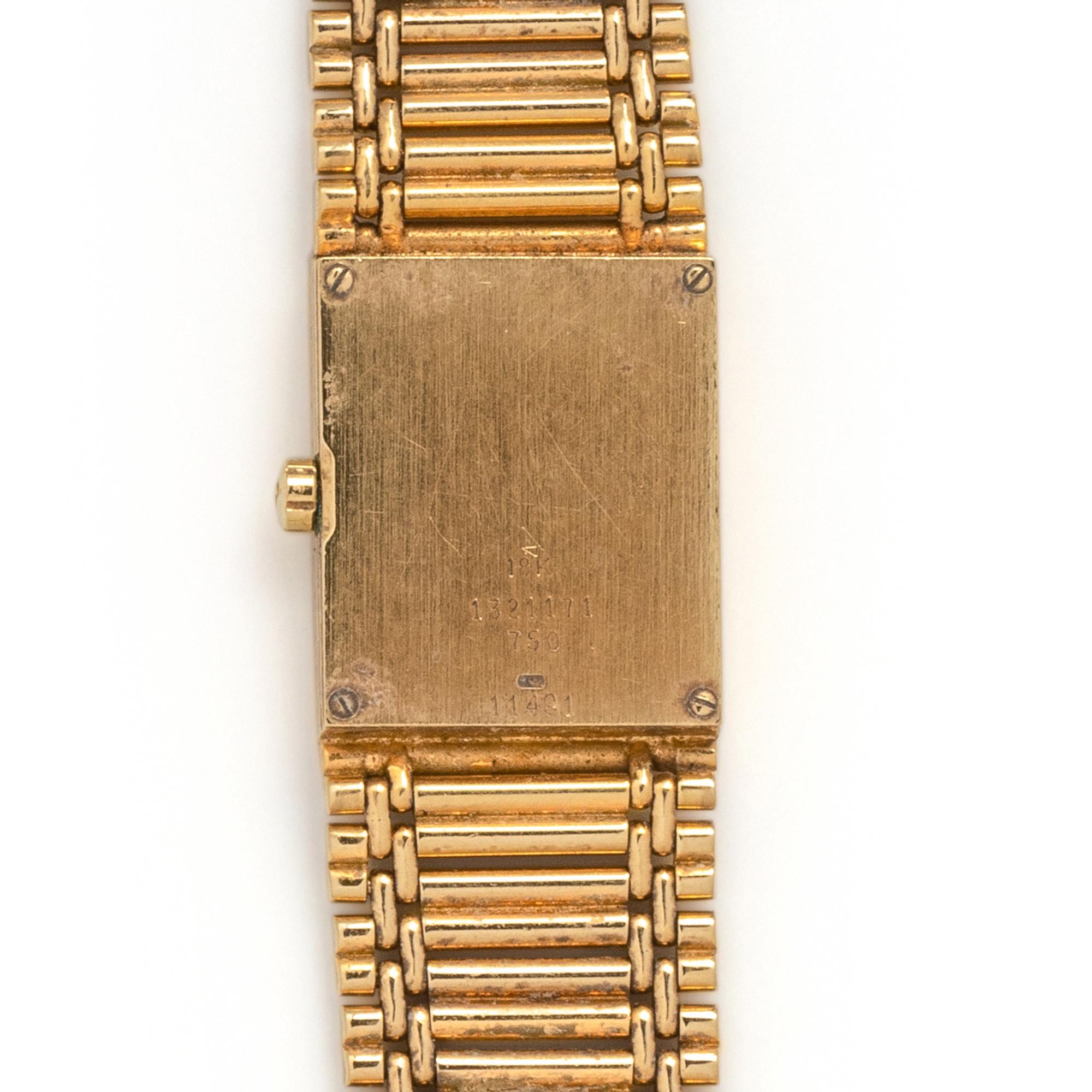 JUVENIA, 18K YELLOW GOLD WATCH