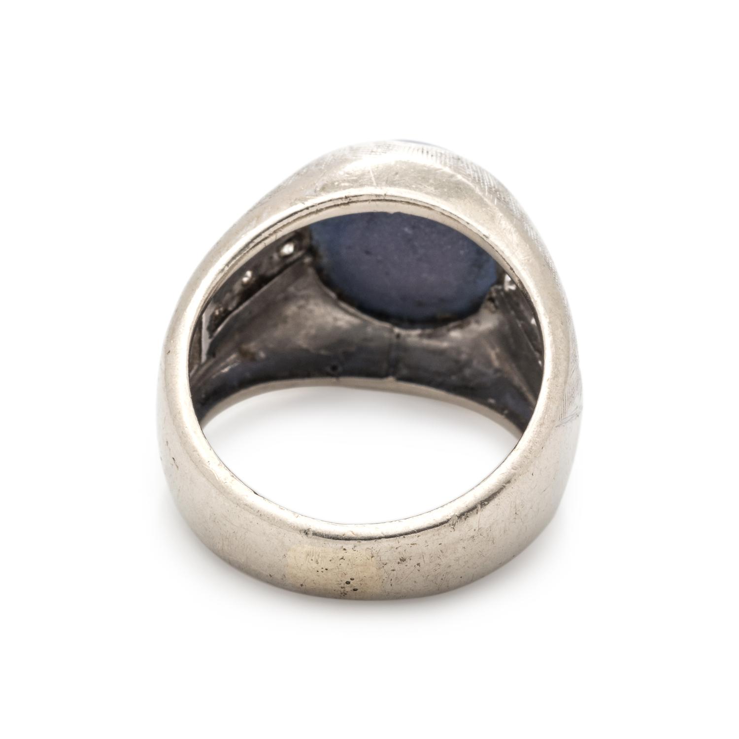 SYNTHETIC STAR SAPPHIRE AND DIAMOND RING