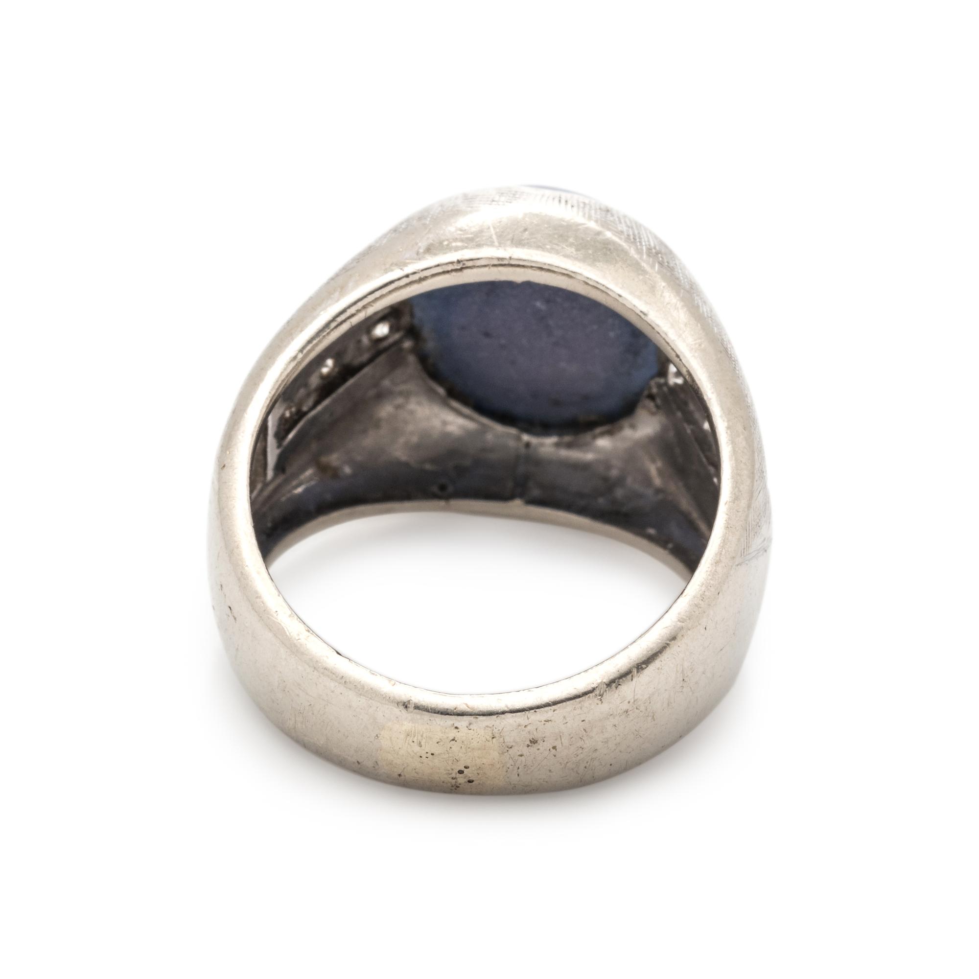 SYNTHETIC STAR SAPPHIRE AND DIAMOND RING