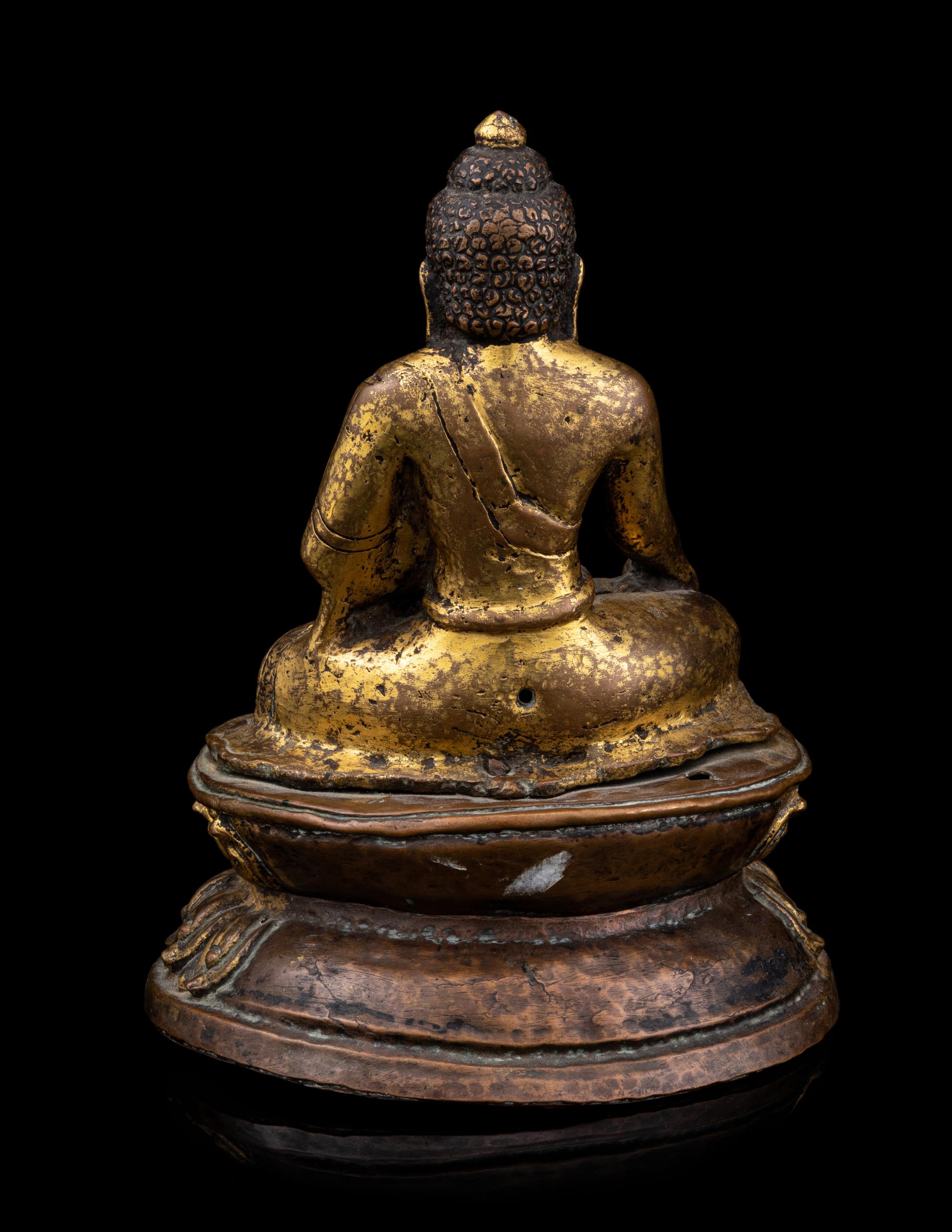 A Nepalese Gilt Bronze Figure of Buddha Shakyamuni